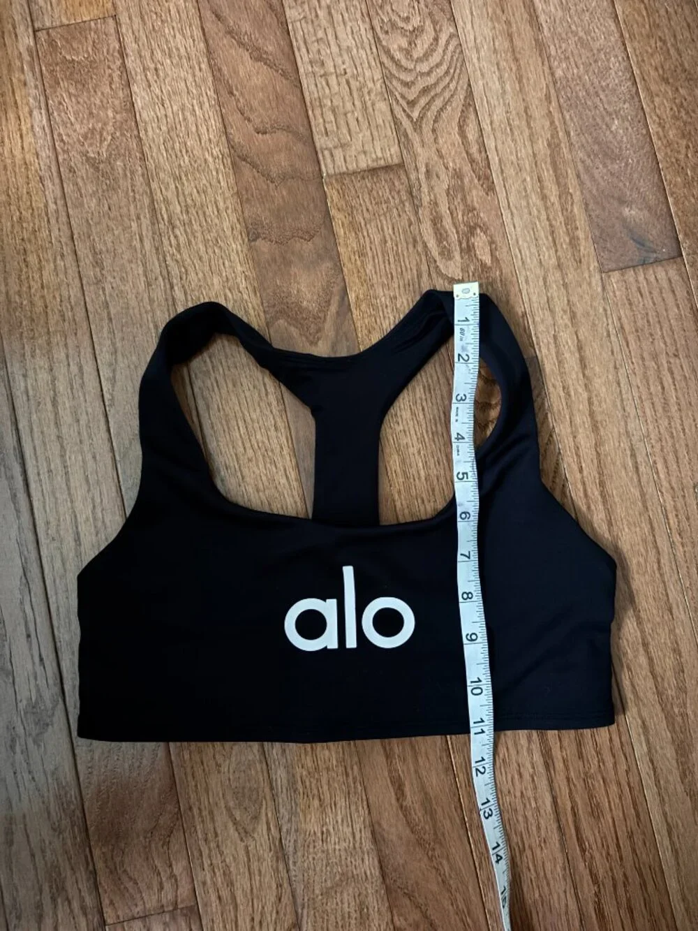 ALO Yoga Black Racerback Sports Bra with Iconic White Logo